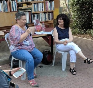 Beit Hava'ad photo 1 (Me smiling as Pnina speaks) - August 5 2019